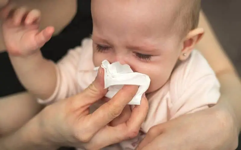 what to do when milk comes out of baby’s nose