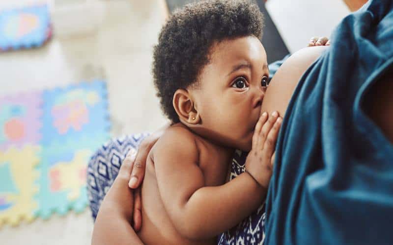 Newborn lip quiver while breastfeeding